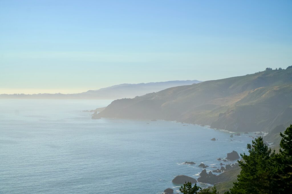 Featured image with an image of the pacific coast and large rocks